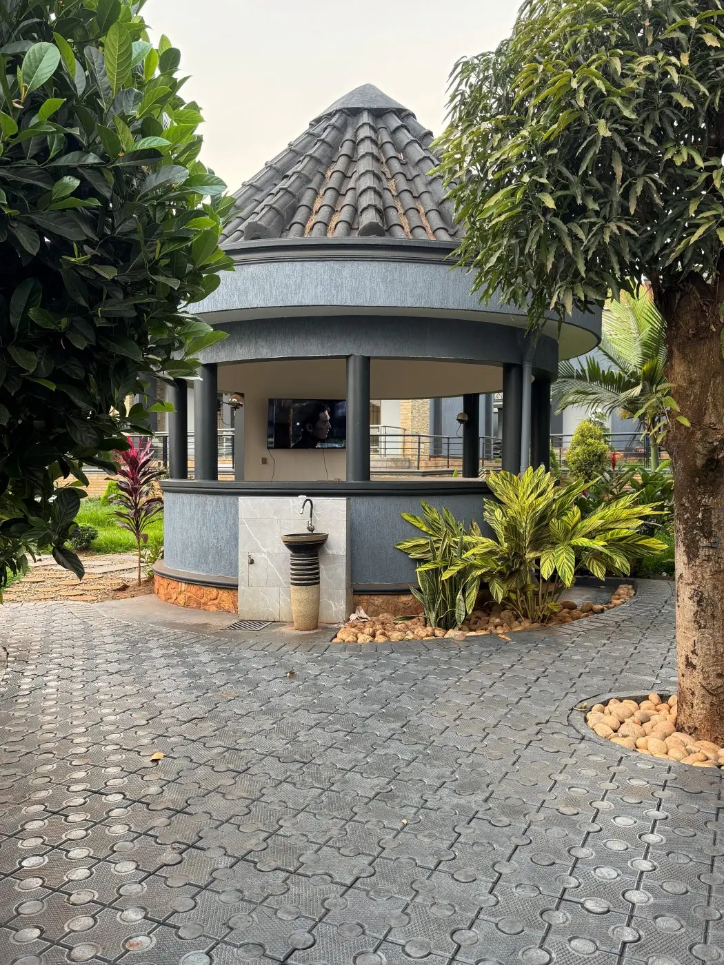 Gatehouse, Home remodel, fountain and landscaping, Jinja
